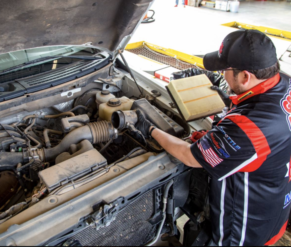 Engine maintenance at Grease Monkey